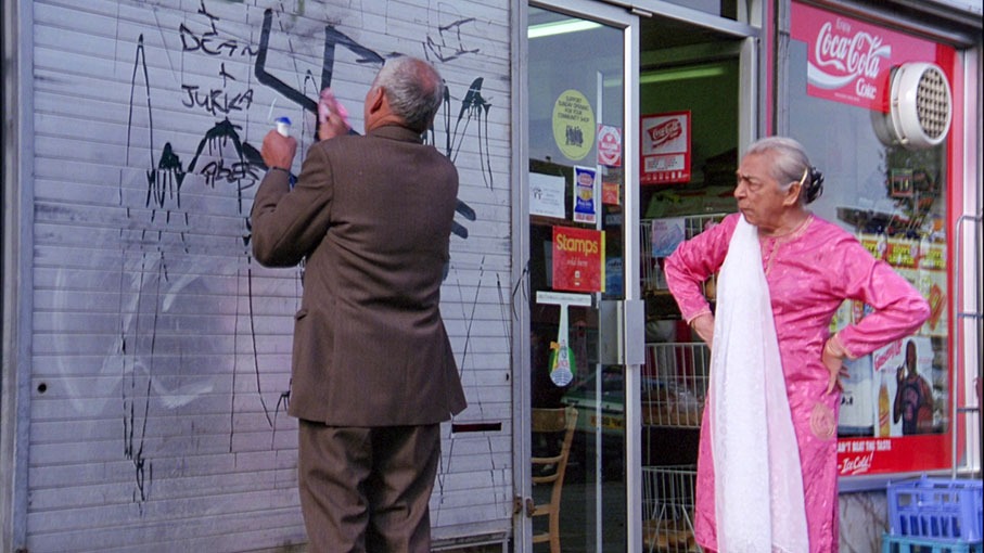 Clearing racist grafitti in Bhaji on the Beach