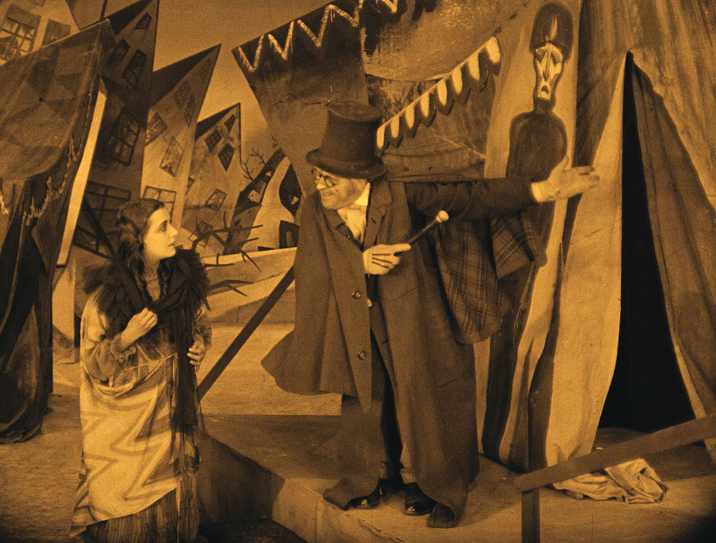 Caligari invites an unsuspecting Jane into his tent