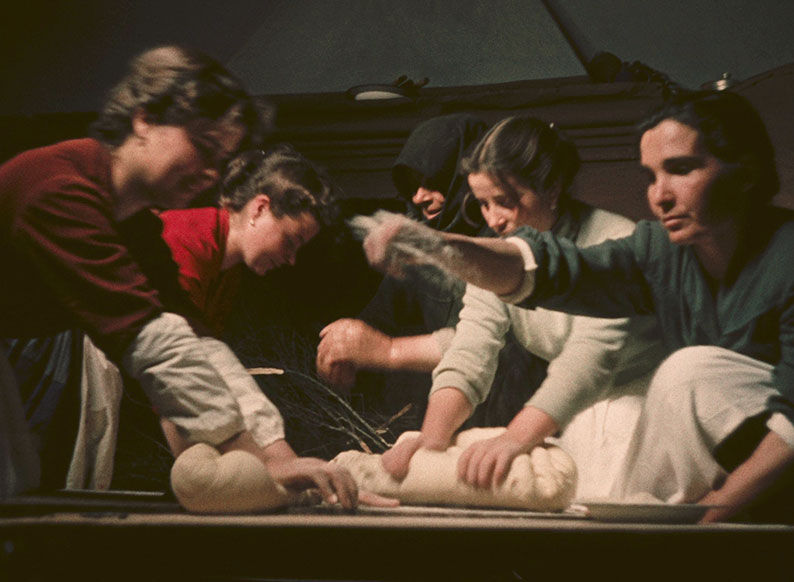 The women make bread in A Day in Barbagia