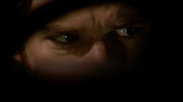 Dexter in dark close-up