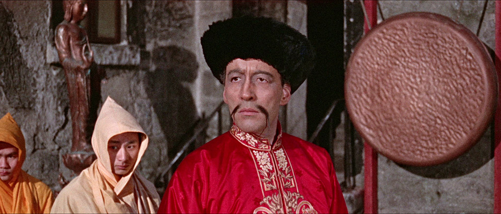 Christopher Lee as Dr. Fu Manchu