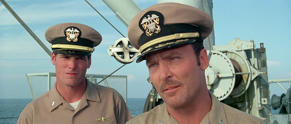 Captain bennett is observed by his concerned adjunct, Phillips