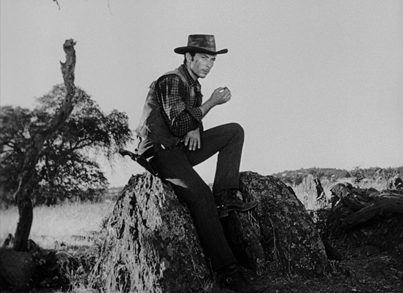 Lee Van Cleef as Colby in the film's opening shot