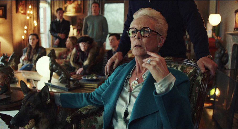 Jamie Lee Curtis as Linda as the family listens