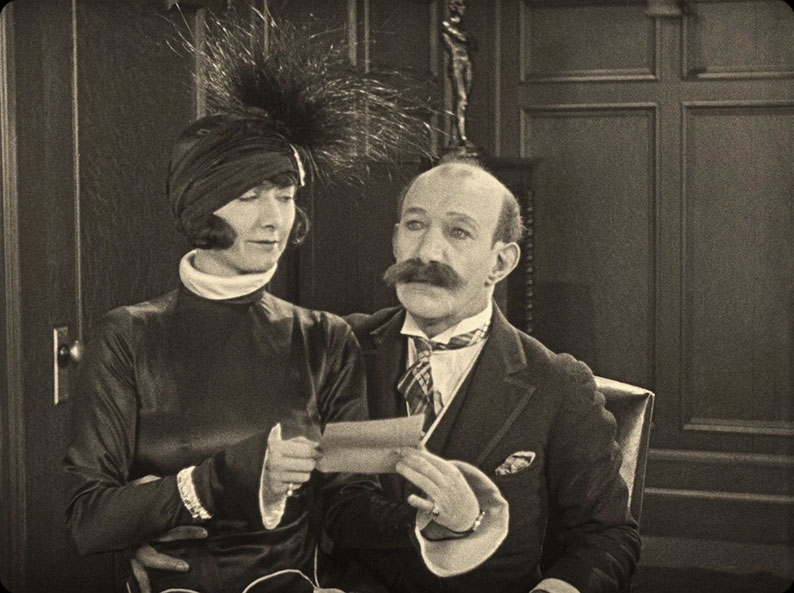 Mae Busch makes an unwelcome reappearance in Joams Finlayson's life in Love 'Em and Weep