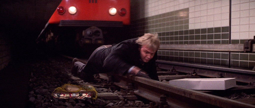 Peter nearly falls victim to an oncoming train