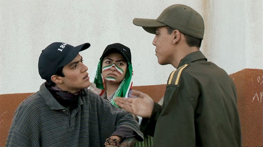 One of the girsl argues with a soldier about the match in Offside
