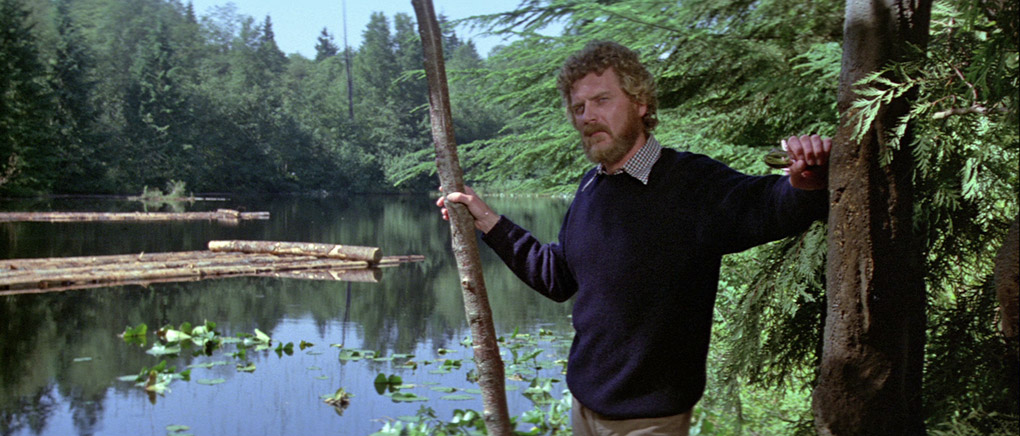 Robert ponders by the lake in which they find the giant tadpole