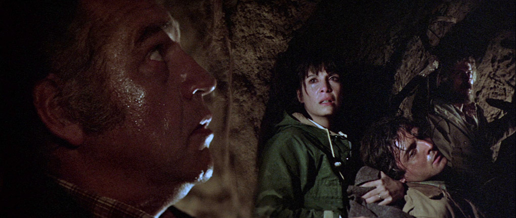 Isley, Maggie, John and Robert wait in an underground tunnel for the beast to leave.