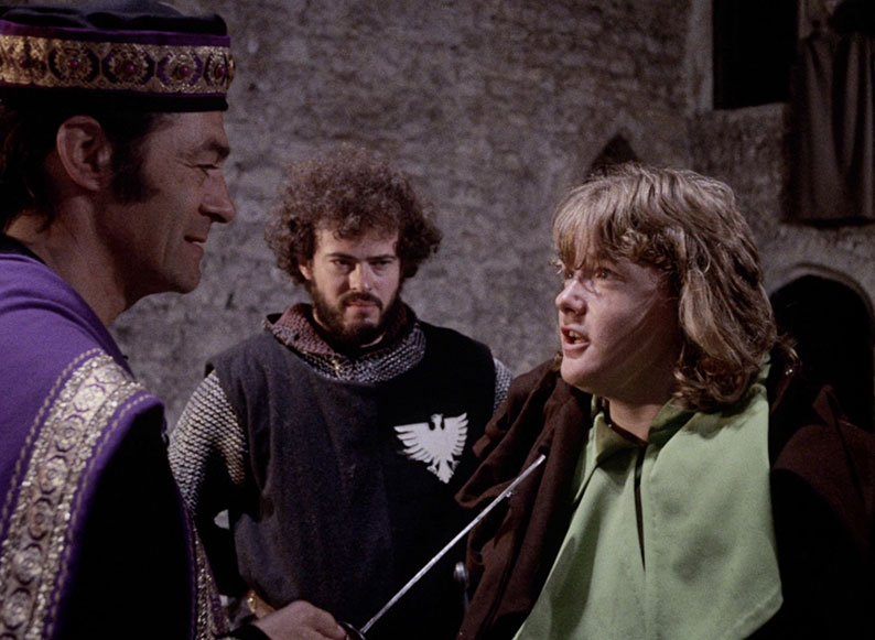 The Baron theatens Robin in Robin Hood Junior