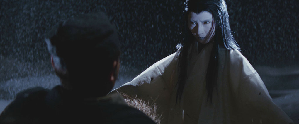 The Snow Woman confronts the terrified Yosaku