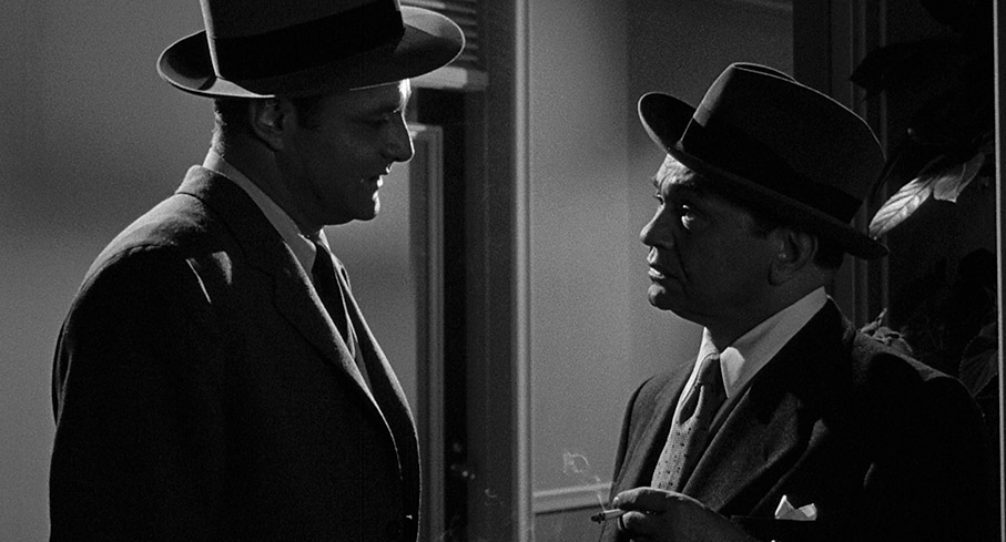 Lloyd and Vince converse in one of the the most noirish shots in Tight Spot