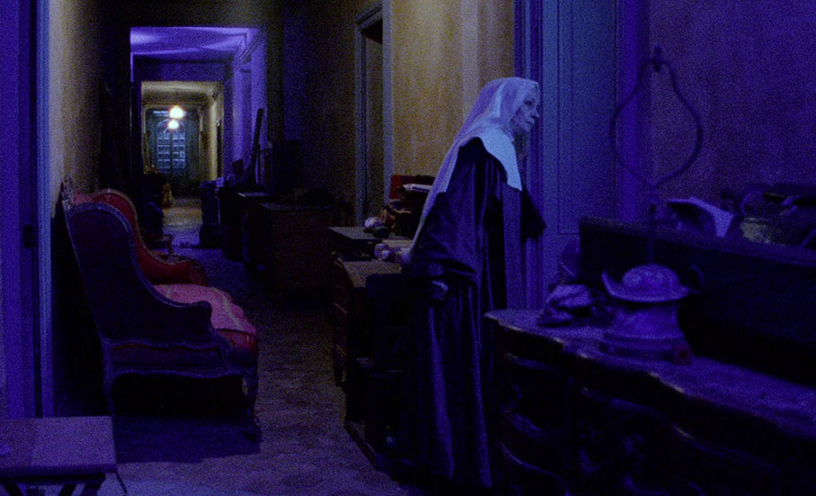 Sister Marthe checks the dormitory at night