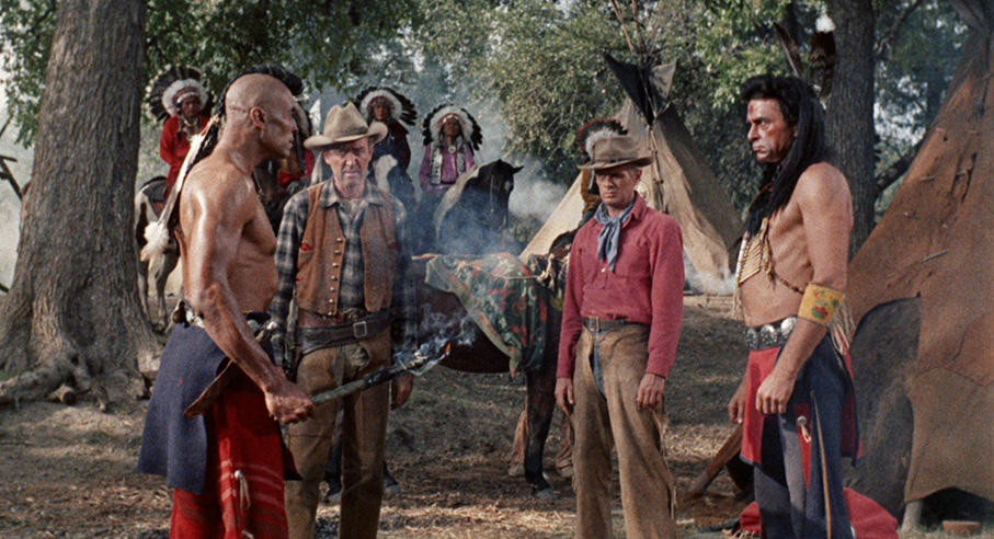McCabe and Gary deal with Chief Quanah Parker (Henry Brandon) and Stone Calf (Woody Strode)