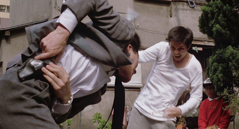 One of the detectives grapples with a particularly violent hoodlum