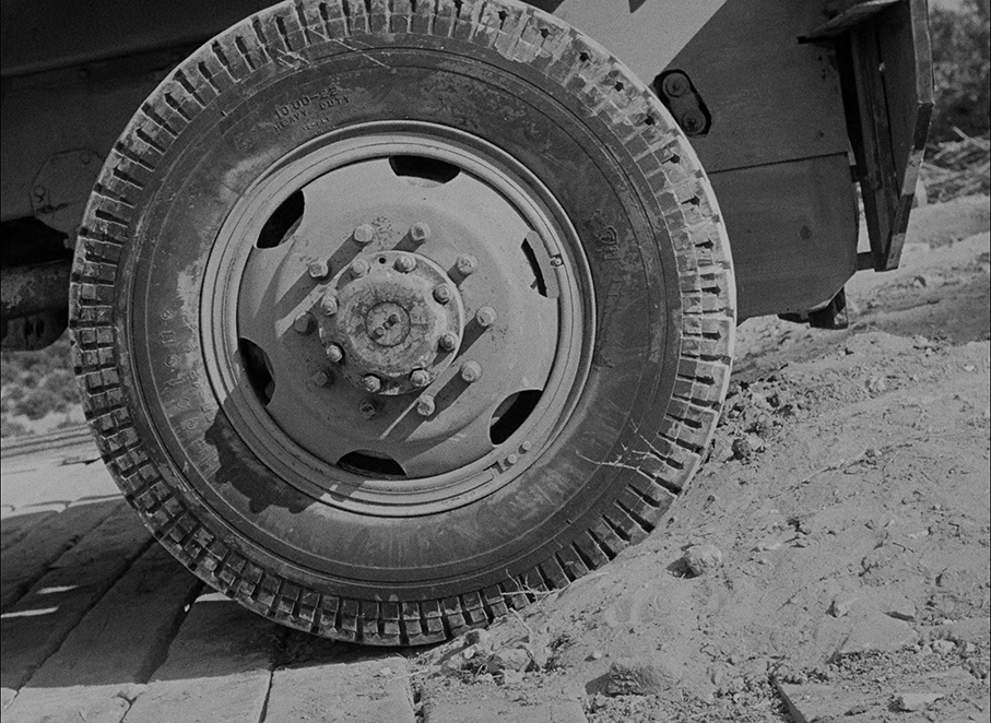 The film's signature wheel close-up shot