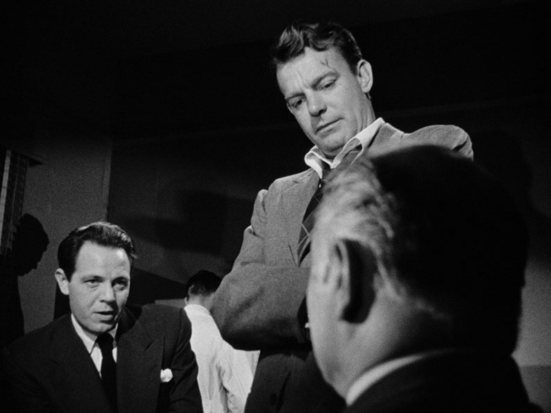 Grayson and O'Hara interrogate a suspect